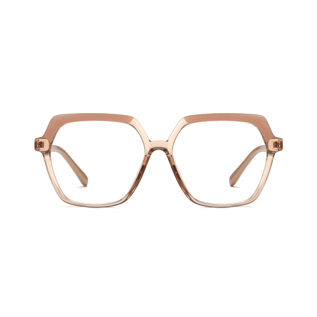 A pair of rose gold hexagon eyeglasses with a bold design.