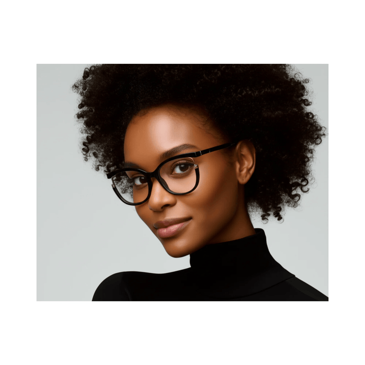 Woman wearing glasses with a neutral background